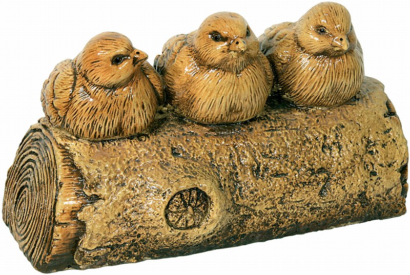 birds on a log statue